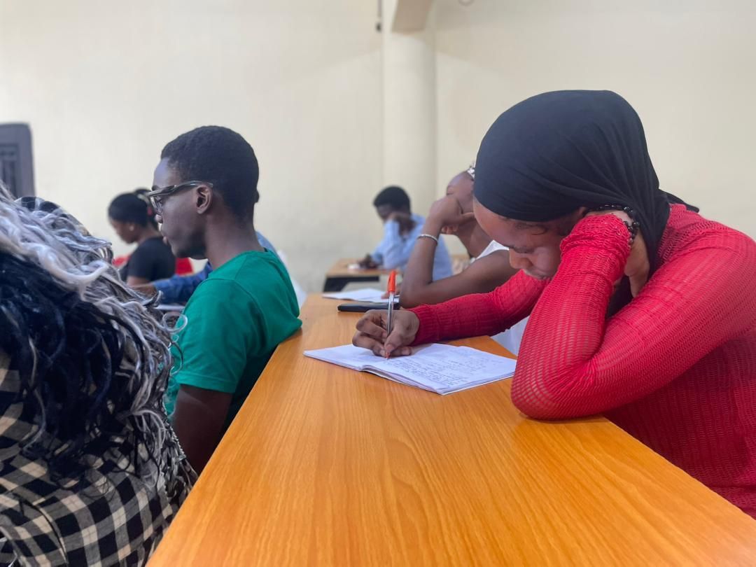 Students concentrating on written work