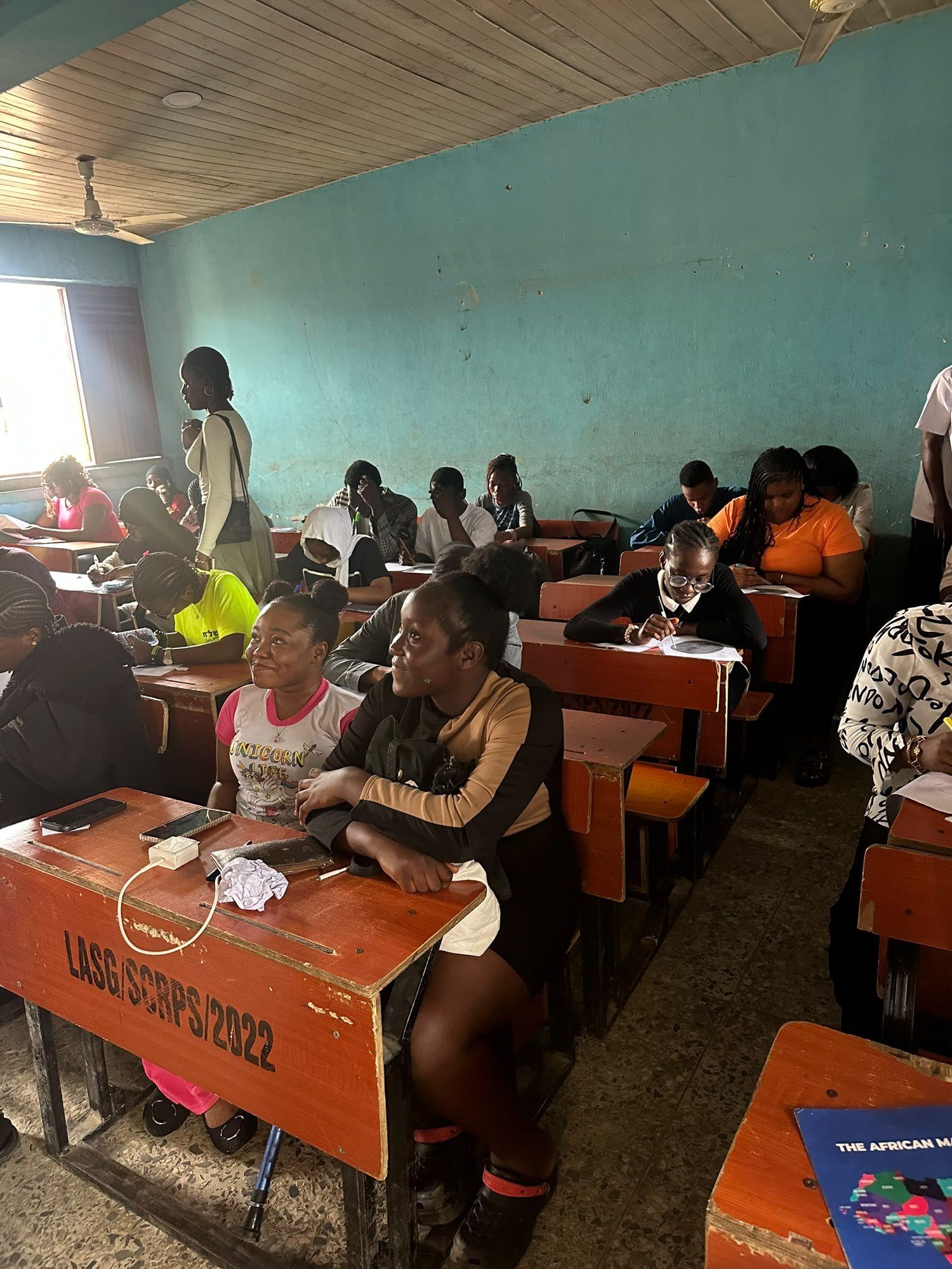 Students seated at long desks during a lesson