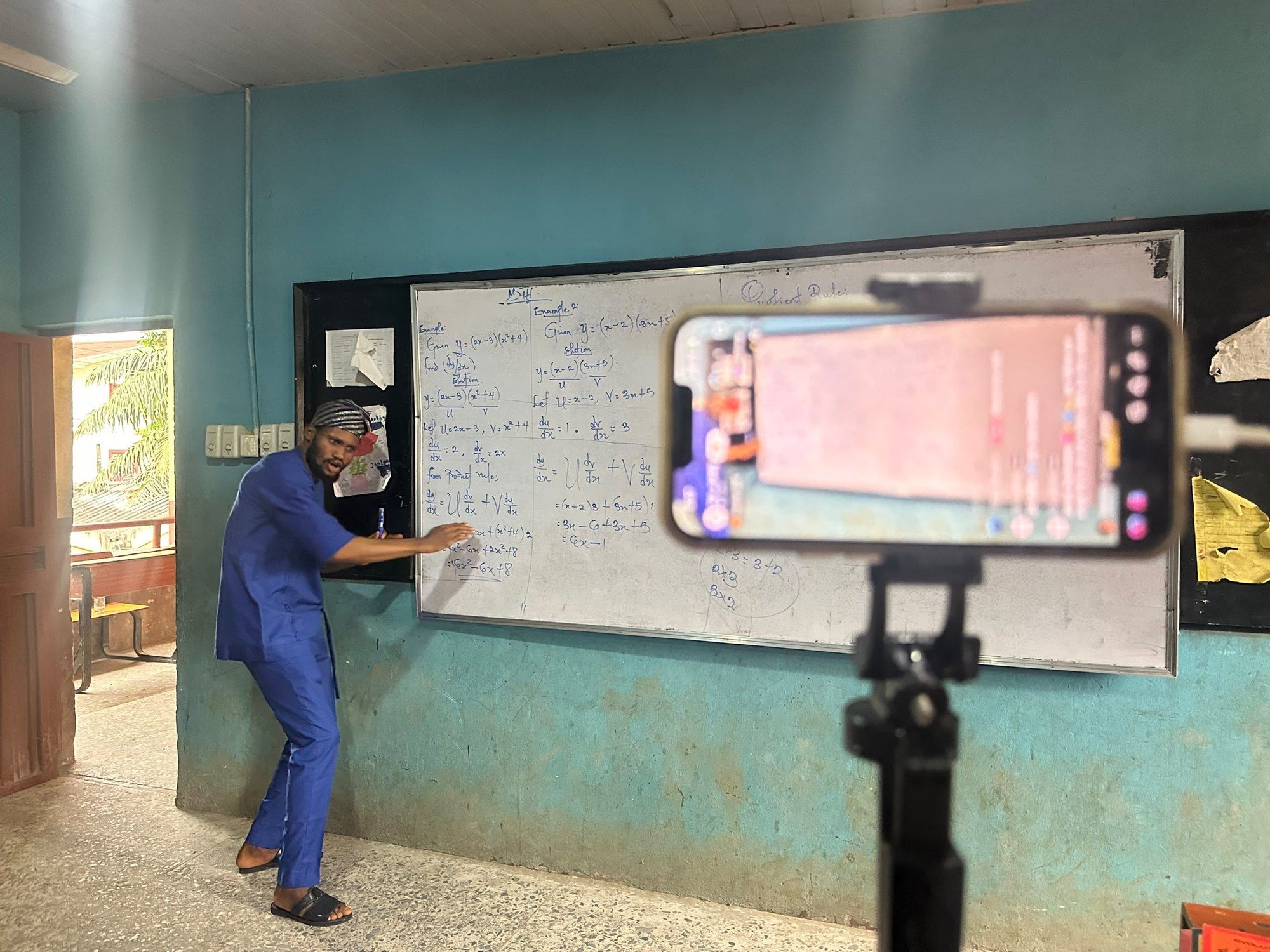 A lesson being recorded on a phone mounted on a tripod