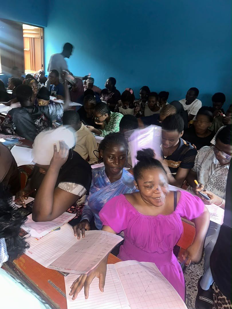 Students writing during a class